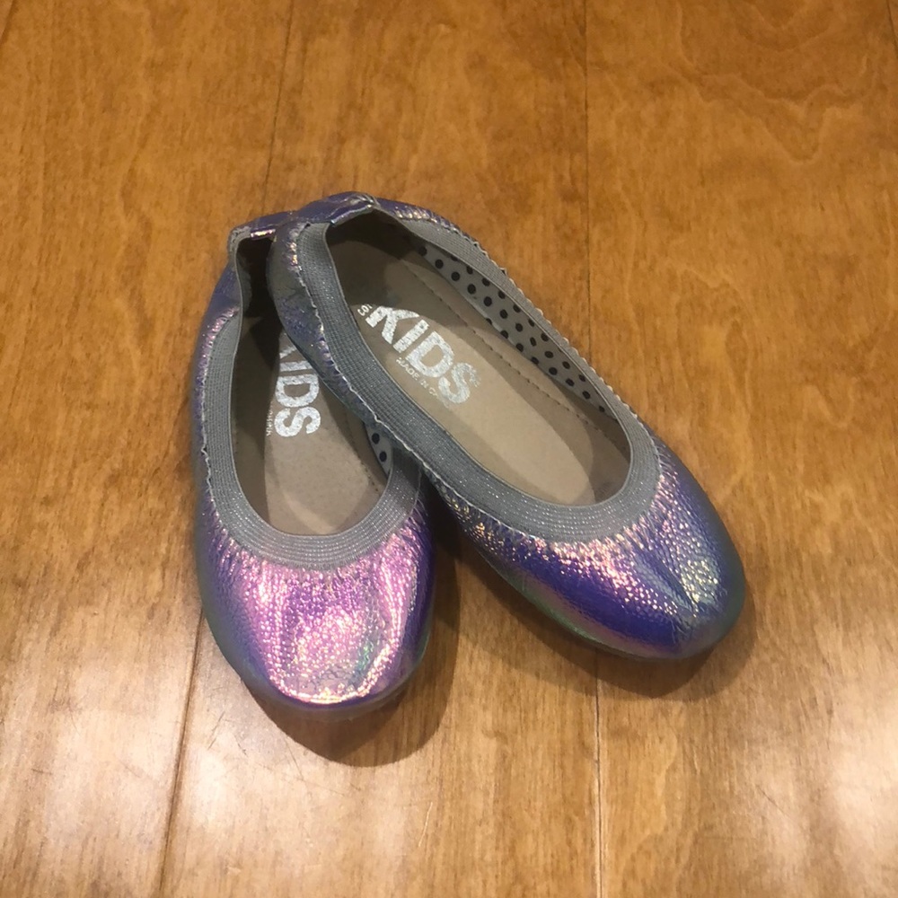 Shiny ballet flats.